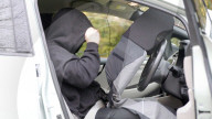 Driver disguised as car seat to for autonomous vehices study.                            