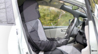 Driver disguised as car seat to for autonomous vehices study.                            
