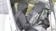 Driver disguised as car seat to for autonomous vehices study.                            
