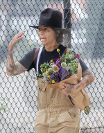 Rarely seen Hollywood music mogul Linda Perry shows off her signature bohemian style on a relaxing summer stroll through LAâ€™s hipster Los Feliz district with a male friend. 