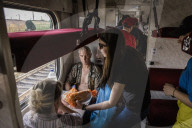 Thousands flee homes as collapse of dam is blamed on Russian forces