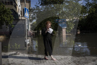Thousands flee homes as collapse of dam is blamed on Russian forces