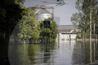 Thousands flee homes as collapse of dam is blamed on Russian forces