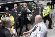 Prince Harry appears to fight back tears and says press intrusion has been 'a lot' during evidence in Mirror Group hacking trial - arrives at court.