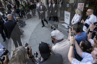 Prince Harry appears to fight back tears and says press intrusion has been 'a lot' during evidence in Mirror Group hacking trial - leaving court.