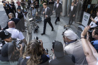 Prince Harry appears to fight back tears and says press intrusion has been 'a lot' during evidence in Mirror Group hacking trial - leaving court.