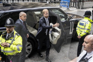 Prince Harry appears to fight back tears and says press intrusion has been 'a lot' during evidence in Mirror Group hacking trial - arrives at court.