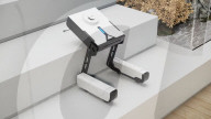 Stair-climbing robot vacuum cleaner.                      