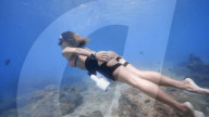 Hands-free underwater thrusters to propel scuba divers.                          