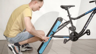 Engineer builds and ride bicyle with no wheels.               