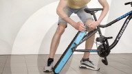 Engineer builds and ride bicyle with no wheels.               