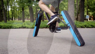Engineer builds and ride bicyle with no wheels.               