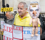 Stop ULEZ Coalition - a cross party campaign coalition formed to stop ULEZ outside The Royal Courts of Justice, London, UK.