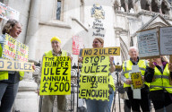 Stop ULEZ Coalition - a cross party campaign coalition formed to stop ULEZ outside The Royal Courts of Justice, London, UK.