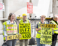 Stop ULEZ Coalition - a cross party campaign coalition formed to stop ULEZ outside The Royal Courts of Justice, London, UK.