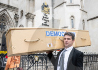 Stop ULEZ Coalition - a cross party campaign coalition formed to stop ULEZ outside The Royal Courts of Justice, London, UK.