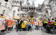Stop ULEZ Coalition - a cross party campaign coalition formed to stop ULEZ outside The Royal Courts of Justice, London, UK.