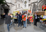 Stop ULEZ Coalition - a cross party campaign coalition formed to stop ULEZ outside The Royal Courts of Justice, London, UK.