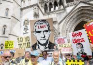 Stop ULEZ Coalition - a cross party campaign coalition formed to stop ULEZ outside The Royal Courts of Justice, London, UK.