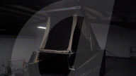 Flat bed accessory makes Musk Cybertruck ia mobile home.                                