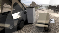 Flat bed accessory makes Musk Cybertruck ia mobile home.                                
