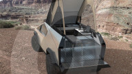 Flat bed accessory makes Musk Cybertruck ia mobile home.                                