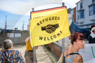 Portland Global Friendship Group at the gates to Portland Port waiting to welcome asylum seekers.