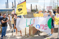 Portland Global Friendship Group at the gates to Portland Port waiting to welcome asylum seekers.