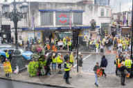 Anti-ULEZ protestors in Tooting Broadway London, Great Britain 
26th August 2023 

People campaigning to stop the ULEZ expansion which is due to commence on 29th August 2023 hold placards towards the traffic around Tooting Broadway
