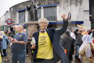 Anti-ULEZ protestors in Tooting Broadway London, Great Britain 
26th August 2023 

People campaigning to stop the ULEZ expansion which is due to commence on 29th August 2023 hold placards towards the traffic around Tooting Broadway