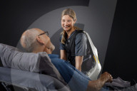 Power suit to help carers left and manouever patients