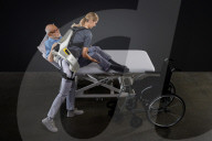 Power suit to help carers left and manouever patients