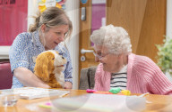 'It's almost magical': how robotic pets are helping UK care home residents