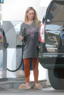 Dancing With The Stars glamour girl Peta Murgatroyd looks unrecognizable as she goes makeup free and pumps gas in her slippers on a hot summer day in Los Angeles.