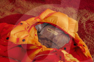 Puffer jacket for keeping cool in Summer -powered by a cold beer.                     
