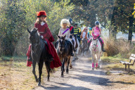 Annual fancy dress charity horse ride on Wimbledon common south west London, UK.
