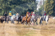 Annual fancy dress charity horse ride on Wimbledon common south west London, UK.