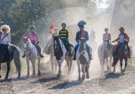 Annual fancy dress charity horse ride on Wimbledon common south west London, UK.
