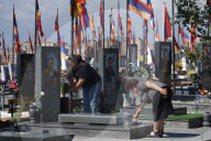 'I came to apologise': Armenian relatives visit soldiers' graves after ceasefire deal