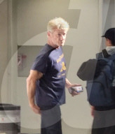 PREMIUM EXCLUSIVE Sean Penn Makes An Underwear Adjustment After Arriving At LAX