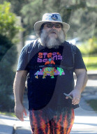 Jack Black, 54, looks unrecognizable as he hikes around his Los Feliz neighborhood with a friend on the afternoon of October 3, 2023