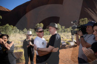 Australians can 'lift burden of history' with yes vote, says emotional Albanese at Uluru