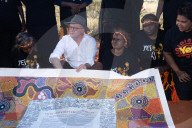 Australians can 'lift burden of history' with yes vote, says emotional Albanese at Uluru