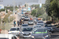 Palestinians with their belongings leave Gaza City as they flee from their homes following the Israeli army's warning, Gaza city, Gaza Strip, Palestinian Territory - 13 Oct 2023