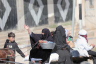 Palestinians with their belongings leave Gaza City as they flee from their homes following the Israeli army's warning, Gaza city, Gaza Strip, Palestinian Territory - 13 Oct 2023