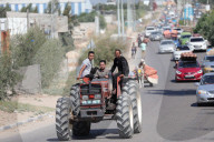 Palestinians with their belongings leave Gaza City as they flee from their homes following the Israeli army's warning, Gaza city, Gaza Strip, Palestinian Territory - 13 Oct 2023