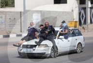 Palestinians with their belongings leave Gaza City as they flee from their homes following the Israeli army's warning, Gaza city, Gaza Strip, Palestinian Territory - 13 Oct 2023