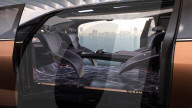 Autonomous luxury minivan for helping passengers and driver bond