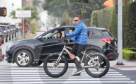 PREMIUM EXCLUSIVE Arnold Schwarzenegger Exudes Terminator Vibes During His Morning Bike Ride