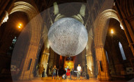 Museum of the Moon by Luke Jerram at Southwark Cathedral, London, UK.